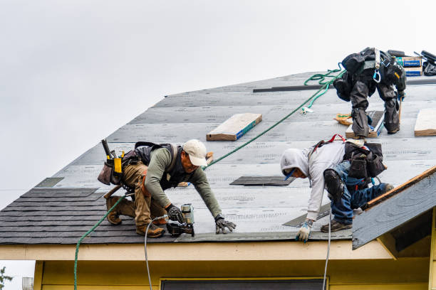 Professional Roofing technician working in Hopedale, MA
